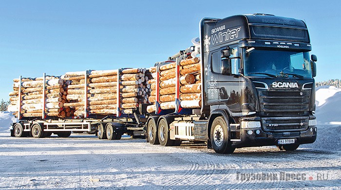 Седельный тягач [b]Scania R 730 LB6x4HNB[/b], лесовоз. Такие машины в Норвегии всегда  с высокой спальной кабиной CR19 Topline, так как у них самые протяжённые маршруты движения и сложные условия работы. В этой машине установлен самый мощный двигатель из имеющихся: DC16 103 730 л.с. (3500 Н∙м). Коробка-автомат GRS0925R. Передняя ось AM950 – 9000 кг, задняя ось ADA1300P RBP735/ RP735 4,05 – 21 000 кг. Подвеска пневматическая. Автомобиль имеет ретардер с тормозным усилием до 4100 Н∙м